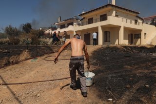 Très prisée par les vacanciers grecs et étrangers, la région de Thymari comprend de nombreuses maisons secondaires d'Athéniens. KEYSTONE/EPA/GEORGE VITSARAS